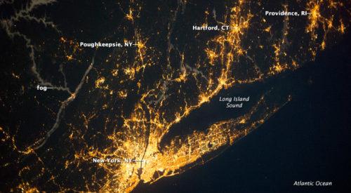 aerial night view of the lights of the NY Metro Region