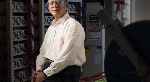 Photo of researcher with safety glasses on.