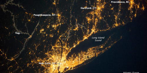 aerial night view of the lights of the NY Metro Region
